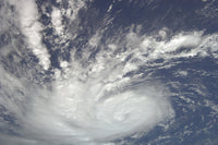 Hurricane Bertha Poster Print showcasing powerful imagery of a hurricane.