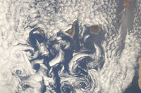 Nadir view of cloud vortices over the Canary Islands poster print.