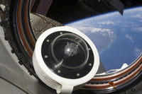A moon rock floats aboard the International Space Station poster print