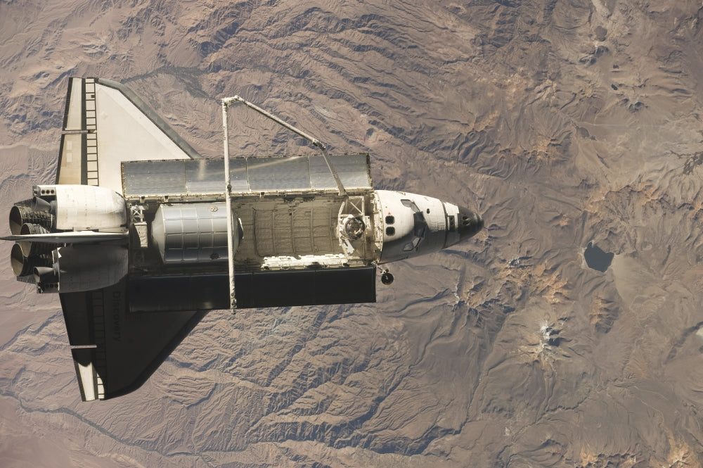 Space Shuttle Discovery Poster Print showcasing the iconic spacecraft.