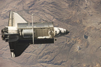 Space Shuttle Discovery Poster Print showcasing the iconic spacecraft.