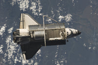Space Shuttle Discovery Poster Print showcasing the iconic spacecraft in vibrant colors.