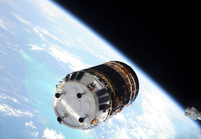 The Japanese H-II Transfer Vehicle Poster Print with Earth's horizon in the background.