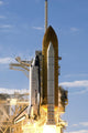Space Shuttle Atlantis lifts off at Kennedy Space Center poster print.