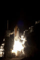Space Shuttle Endeavour lifting off into the night sky poster print.