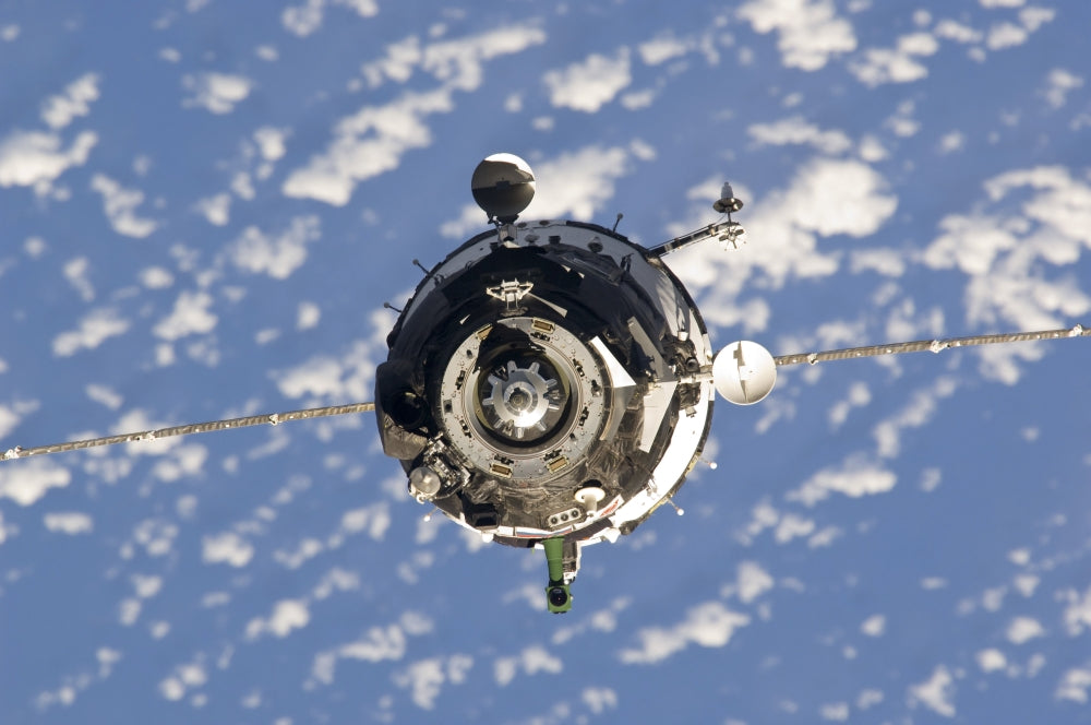 Poster print of Soyuz TMA-01M spacecraft approaching the International Space Station on October 9, 2010.
