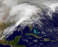 Satellite view of a massive winter storm over the United States poster print.