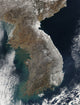 Satellite view of snowfall along South Korea's east coast, winter landscape poster print.