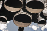 Partial view of Space Shuttle Discovery's three main engines captured in stunning detail.