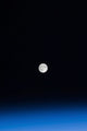 The Moon and Earth's atmosphere poster print showcasing celestial beauty.
