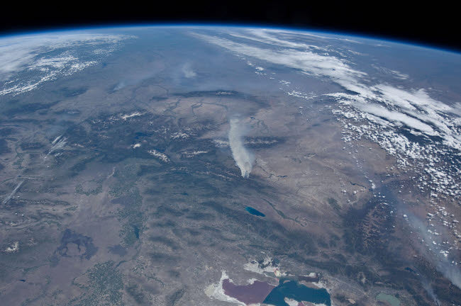 View from space of the wildfires in the western and southwestern United States poster print.