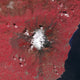 Satellite view of Mount Etna emitting volcanic gases poster print.