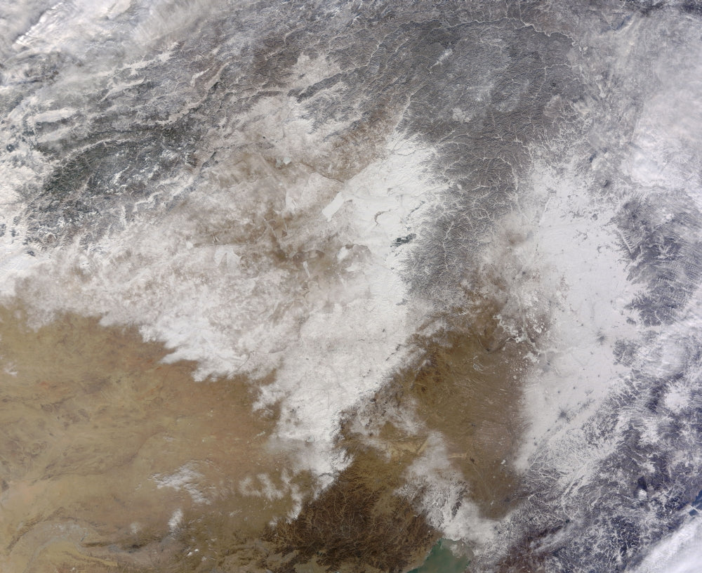 Satellite view of snow covering northeastern China on January 8, 2014.