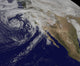 Satellite view of swirling Eastern Pacific Ocean storm system poster print.