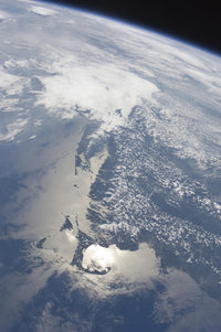 Sunglint on the Massachusetts coastline poster print featuring sunlight reflection on ocean waves.