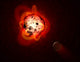 Illustration of a red dwarf star and hypothetical exoplanet.