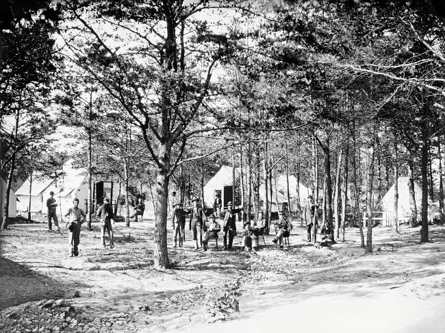 Military camp set up in the woods during the American Civil War poster print.