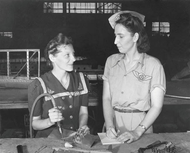 Women working in the Assembly and Repair Department at Naval Air Base in Texas circa 1942 poster print.