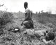 Poster print of a young American lieutenant treated by a medic in Vietnam, 1966.