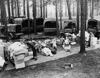 Rations inspected before loading during Louisiana Maneuvers, 1942 poster print.