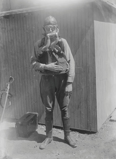 March 1, 1918 US Boy Scout wearing a gas mask poster print.