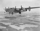 B-24E Liberator bomber poster print on tarmac at Willow Run, Michigan.