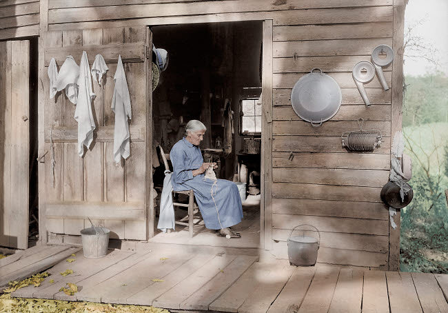 Elder woman knitting on a farm in Tennessee, 1933 poster print.