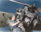 Aviation mechanic rebuilding airplane engine poster print.