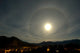 Harvest Moon Halo Poster Print by Yuichi Takasaka showcasing a lunar phenomenon in Lumby, British Columbia.