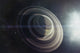 Light from a nearby star illuminating a massive ringed gas giant poster print