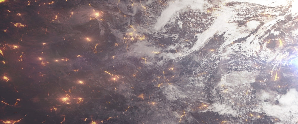 Aerial view poster of a planet being ripped apart by lava