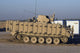 Baqubah Iraq M113 Variant Poster Print showcasing military machinery.