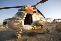 Abandoned Mi-2 helicopter on the flight deck at Camp Warhorse in Baqubah, Iraq.