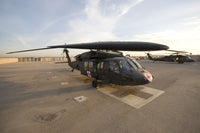 UH-60 Blackhawk Medivac helicopter on flight deck at Camp Warhorse poster print.