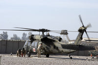 UH-60 Blackhawk Medivac helicopter refueling at Camp Warhorse poster print.