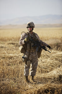 U.S. Marine patrols wadi near Konduz, Afghanistan poster print.