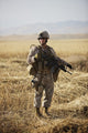 U.S. Marine patrols wadi near Konduz, Afghanistan poster print.