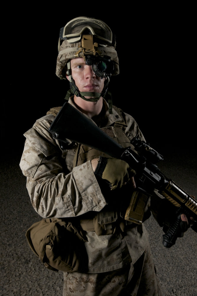 Portrait of a U.S. Marine wearing a night vision device poster print.