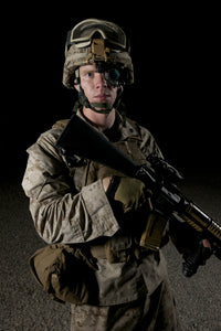 Portrait of a U.S. Marine wearing a night vision device poster print.