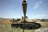 Poster print of a Russian T-55 main battle tank in a junkyard in Kunduz, Afghanistan.