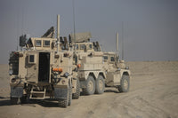U.S. Army Cougar MRAP vehicles in Kunduz, Afghanistan poster print.