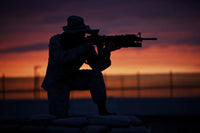 Silhouette of a U.S. Marine on a bunker at sunset in Northern Afghanistan.