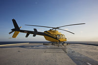 Bell 407 Utility Helicopter on Oil Rig Helipad Poster Print