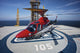 AgustaWestland AW109E Helicopter parked on oil rig helipad poster print