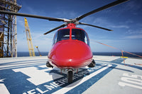 AgustaWestland AW109E helicopter on oil rig helipad in Gulf of Mexico poster print.
