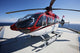 Eurocopter EC135 utility helicopter on oil rig helipad in Gulf of Mexico poster print.