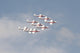 Snowbirds 431 Air Demonstration Squadron performing aerobatics at Wings Over Houston 2007 airshow poster print.