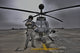 Pilot in front of OH-58D Kiowa helicopter high dynamic range image poster.