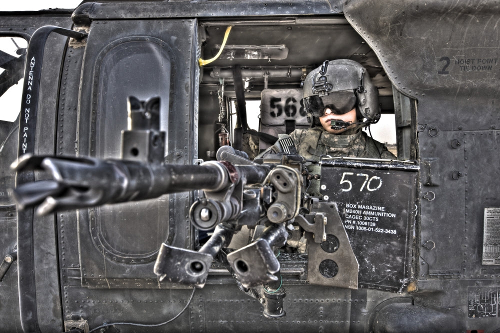 UH-60 Black Hawk Door Gunner Poster Print featuring military action