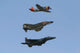 Heritage Flight Poster Print featuring F-15 Eagle, P-47 Thunderbolt, and F-4 Phantom